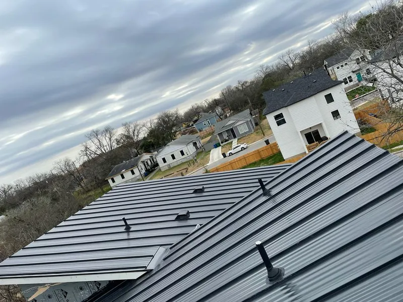 Standing seam metal roof panels with vents for Skylight Repair in Highland Park